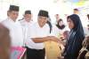 Pj Bupati Tangerang Dan Pj Gubernur Banten Berikan Santunan Kepada Keluarga KPPS yang meninggal