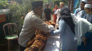 Lomba memandikan jenazah di Kecamatan Benda, Kota Tangerang.