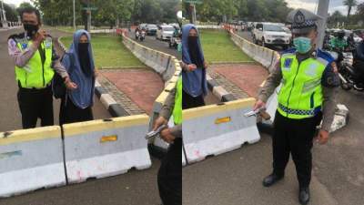 Perempuan Bersenjata Api Terobos Istana Negara