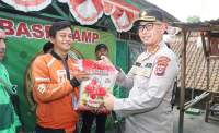 Kapolresta Tangerang Berikan Bantuan ke Komunitas Ojeg Online