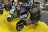 Ilustrasi motor listrik di sebuah pameran otomotif.