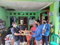 Sinergi Bersama Pemerintah, KNPI dan PMI Bantu Warga Terdampak Covid-19