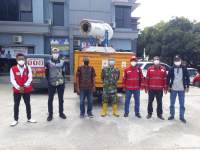 PMI Rajeg Gencarkan Penyemprotan Disinfektan di Sepanjang Jalan Desa