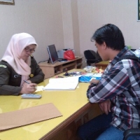 Ryan Erlangga saat meloparkan dugaan gratifikasi U-Turn Jl MH Thamrin, Kota Tangerang