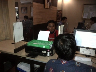 Erlan, saat melaporkan penganiyaan terhadap dirinya kepada Polres Tangerang Kota