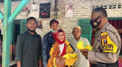 Bhabinkamtibmas Polsek Air Joman Polres Asahan Bantu Warga Binaannya