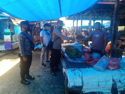 Wujud Program Polri Personel Polsek BP Mandoge Polres Asahan Berikan Himbauan AKB di Pekan Minggu Dsn II