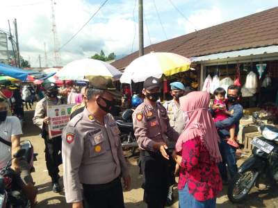 Ops Yustisi Covid-19, Polsek Baros Bagikan Masker