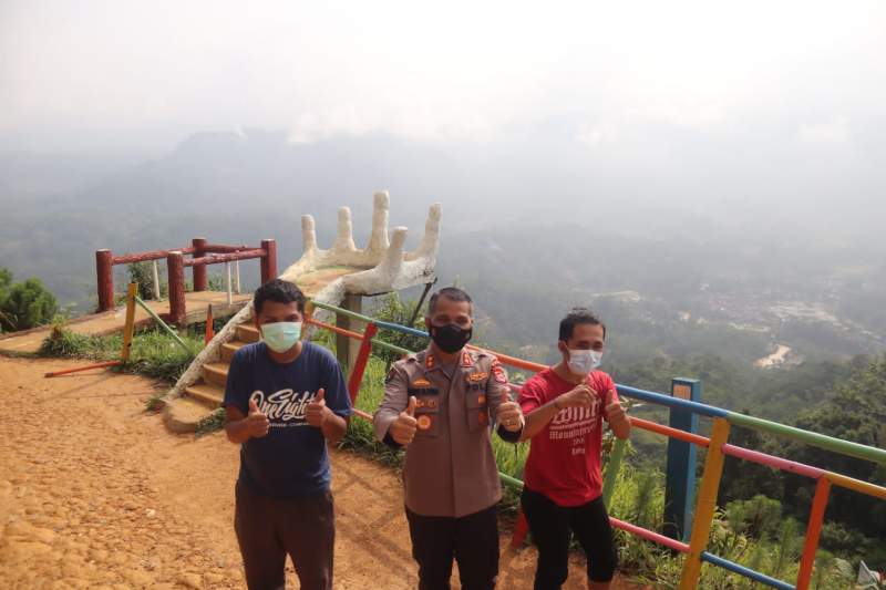 AKBP Shinto Himbau Pengunjung Wisata Negeri Diatas Awan Patuhi Prokes