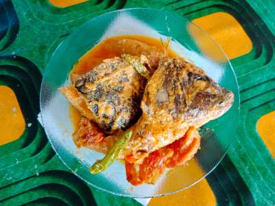 Gulai kepala ikan tilapia (Grandong) salah satu hidangan diminati masyarakat.