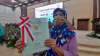 Salahsatu perwakilan warga penerima sertifikat PTSL di gedung DPRD Kota Tangsel.