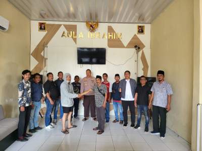 Polsek pasar Kemis bersama GP Ansor damaikan warga.