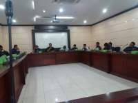 Anggiat Sitohang saat menerima tamu ABN Partai Nasdem