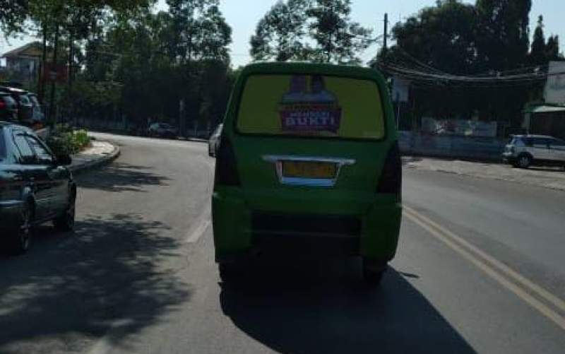 Bentuk Kecintaan, Sopir Angkot di Kabupaten Serang Branding Mobil Wajah Tatu-Pandji