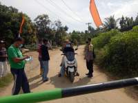 Cegah Penyebaran Covid 19, Polsek Dolok Masihul Lakukan Penyekatan Masyarakat