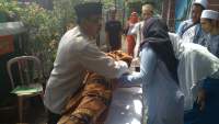 Lomba memandikan jenazah di Kecamatan Benda, Kota Tangerang.